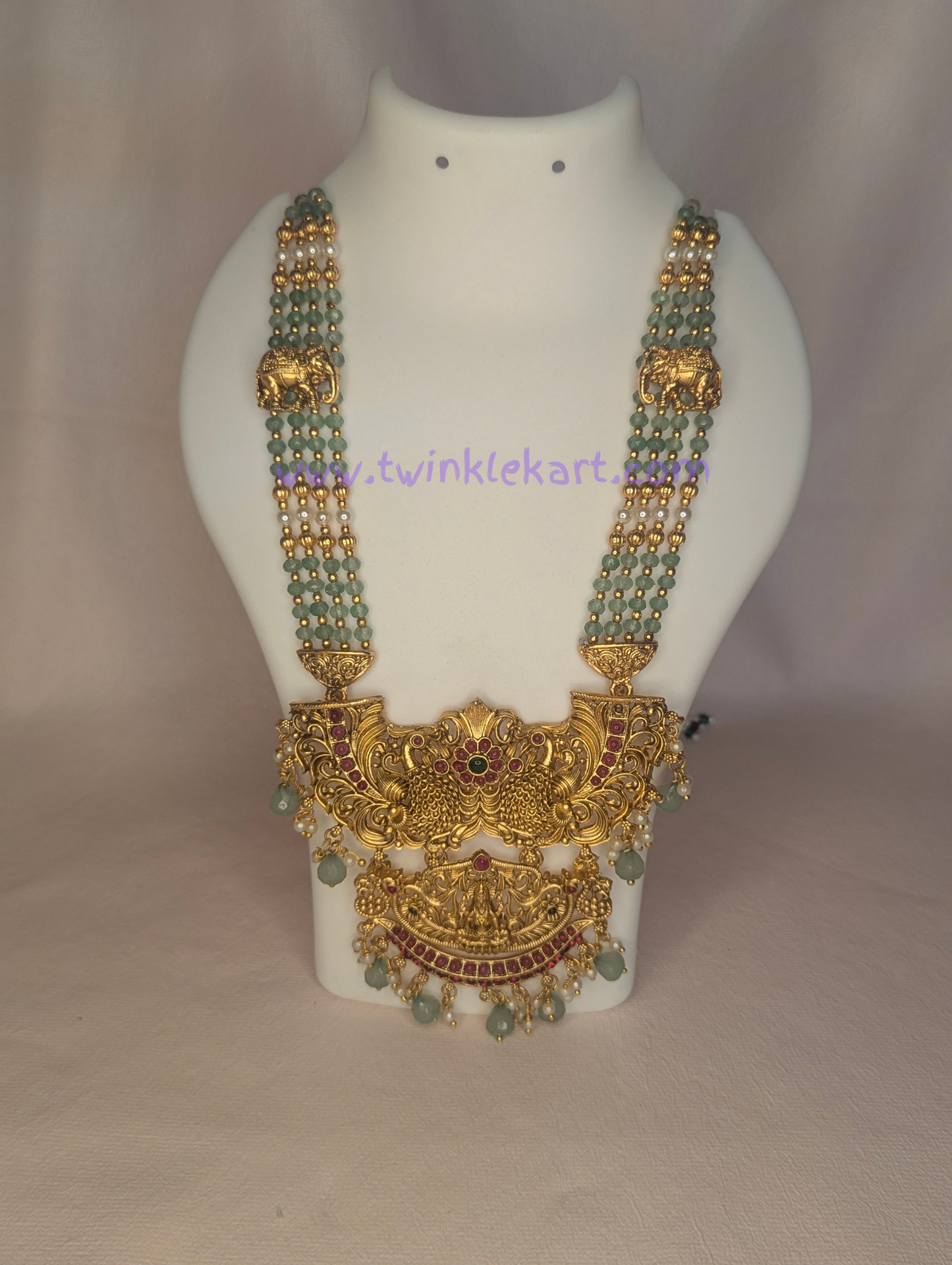 Grand Green Beaded Lakshmi Pendant Long Haram Set With Earrings